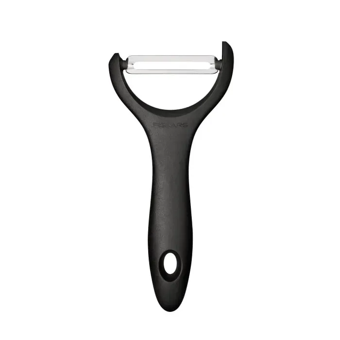Curatitor legume, Fiskars Essential, cu lama inox, maner plastic